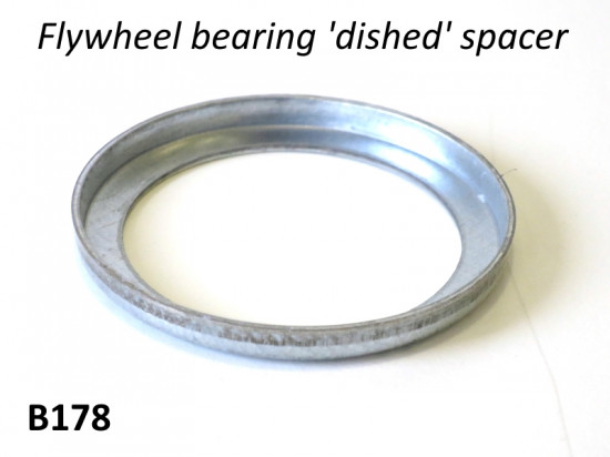 'L' shaped spacer for magneto flange flywheel bearing