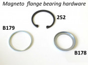 'L' shaped spacer for magneto flange flywheel bearing