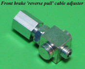 Reverse pull front brake cable adjuster