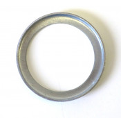 'L' shaped spacer for magneto flange flywheel bearing